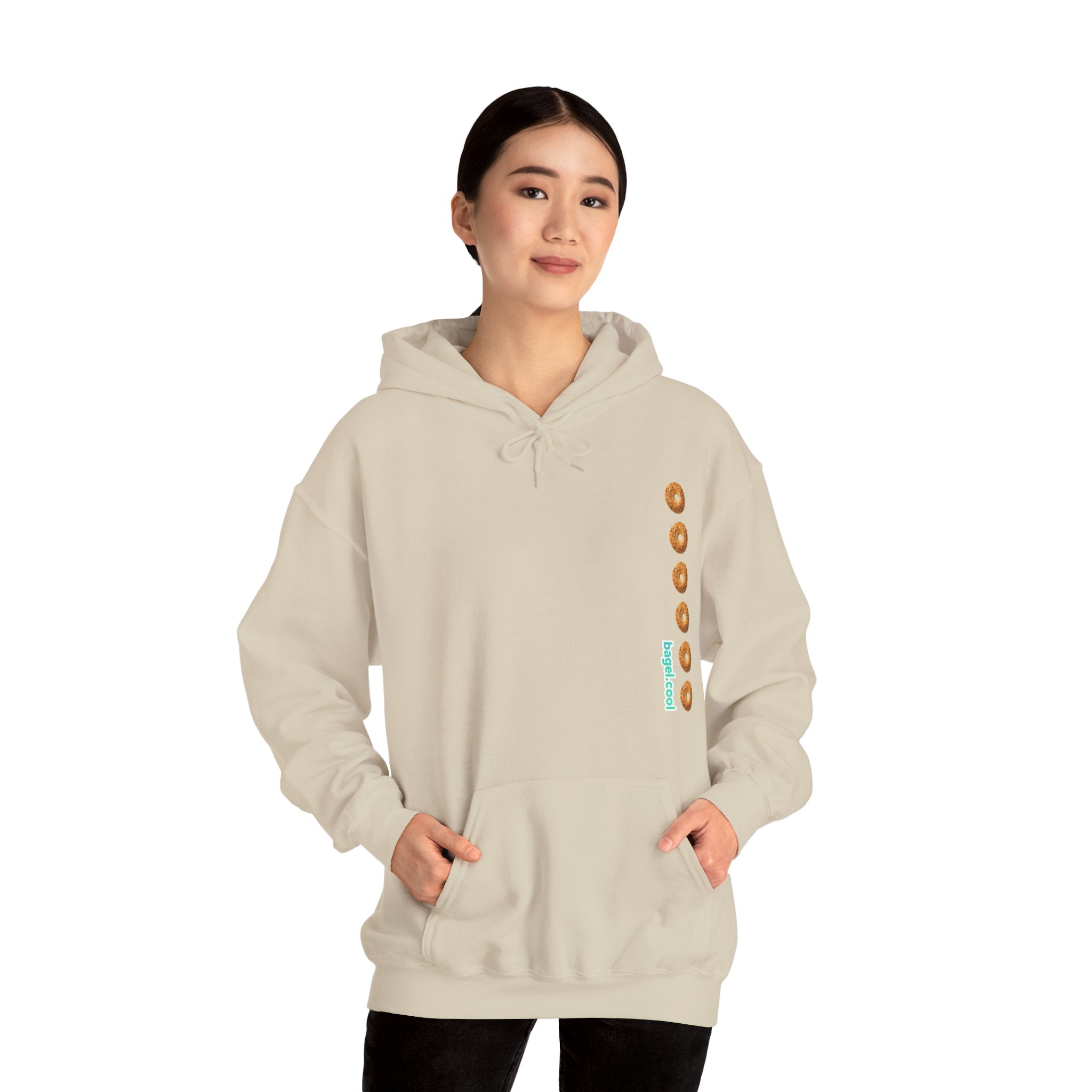 A women wearing a Sand hoodie with a stripe made of bagels on the right