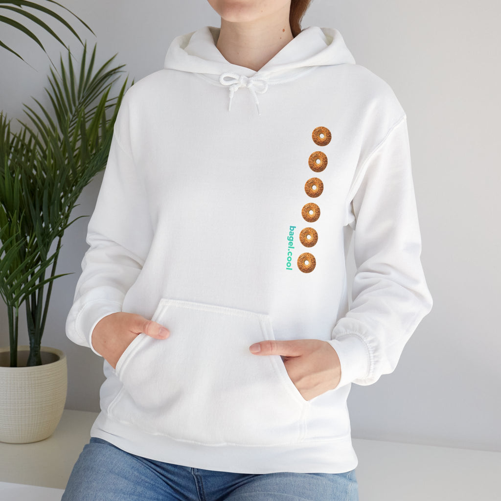 A women wearing a White hoodie with a stripe made of bagels on the right